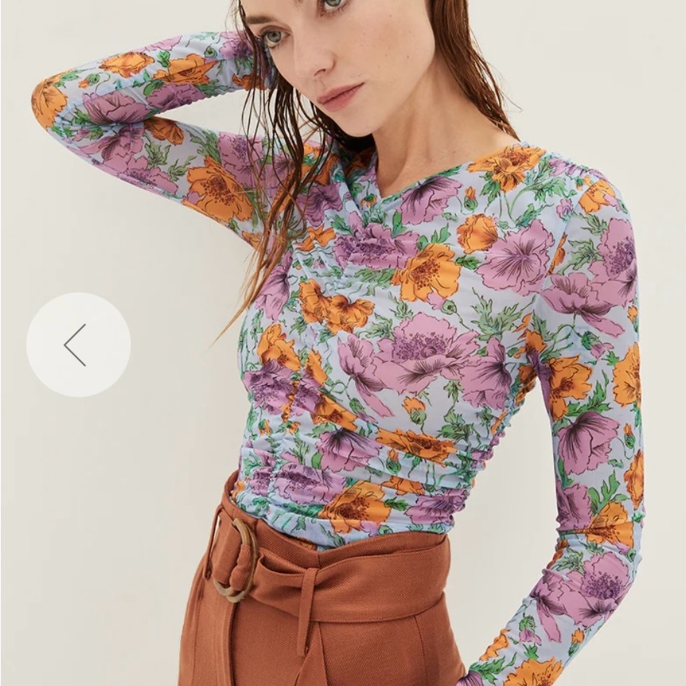 Colorful, fun and flattering Veronica beard top with front and back rouching.